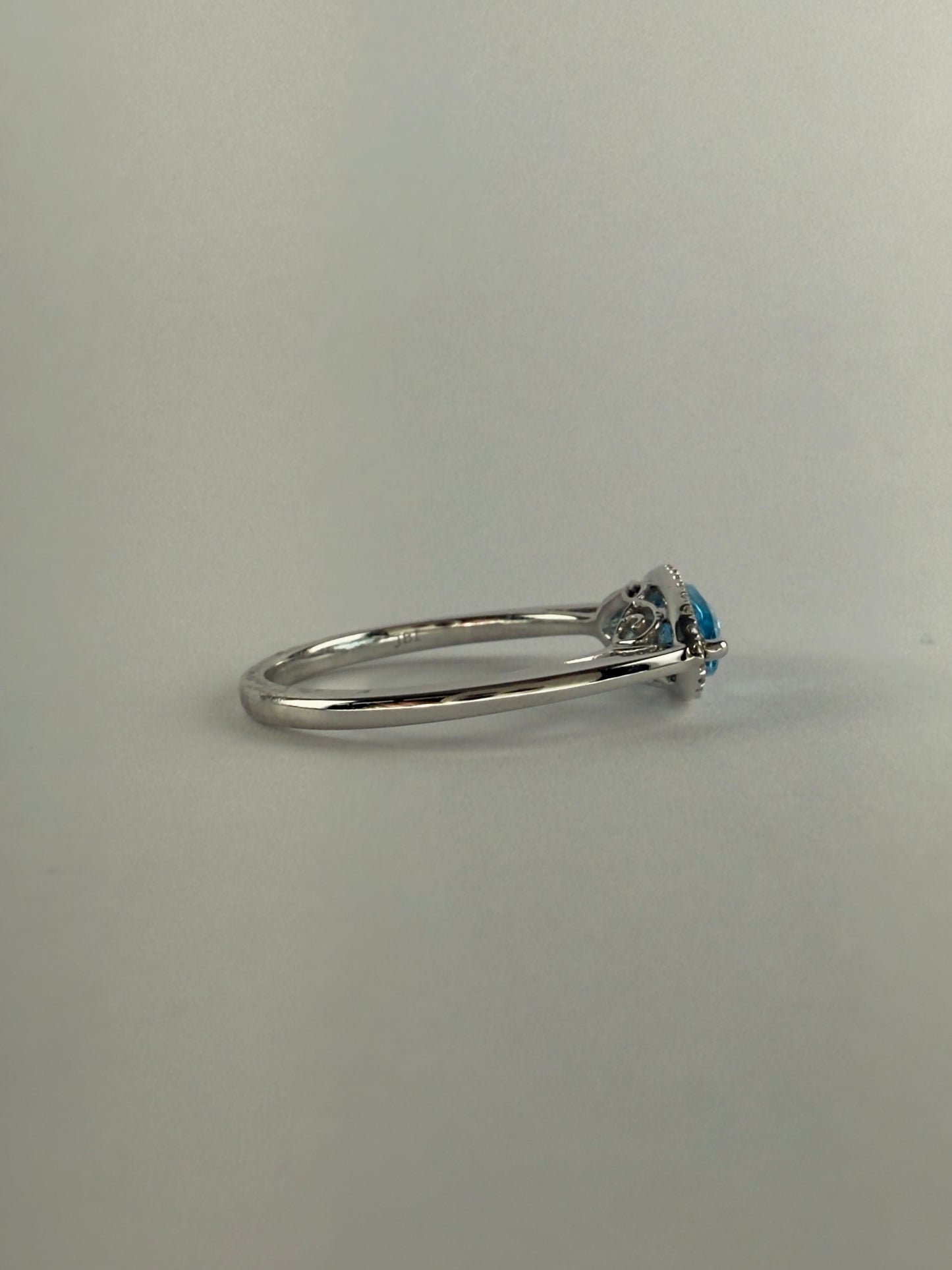 White Gold Blue Topaz and Diamond Ring