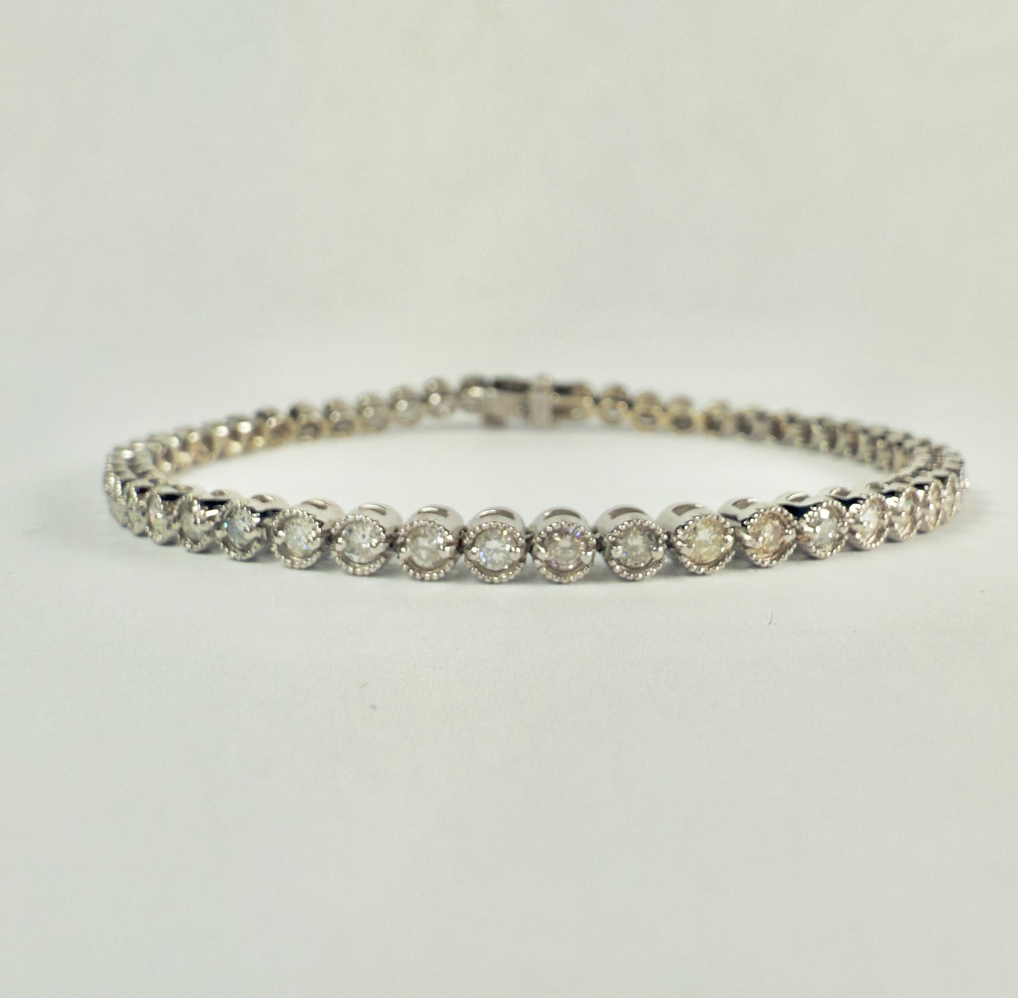 Round Brilliant Cut Diamond Bezel Set Tennis Bracelet