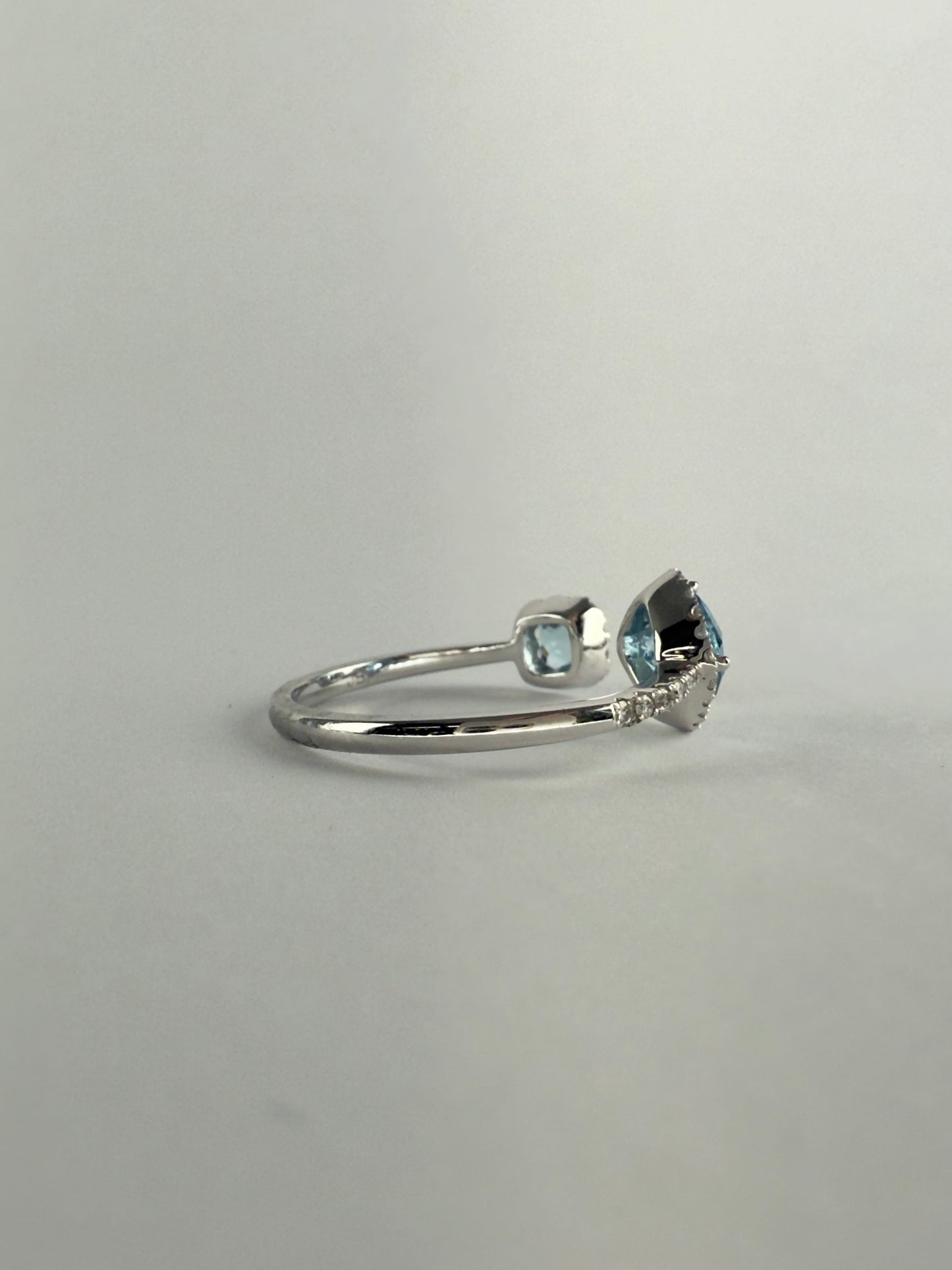 Blue Topaz and Diamond Open Ring