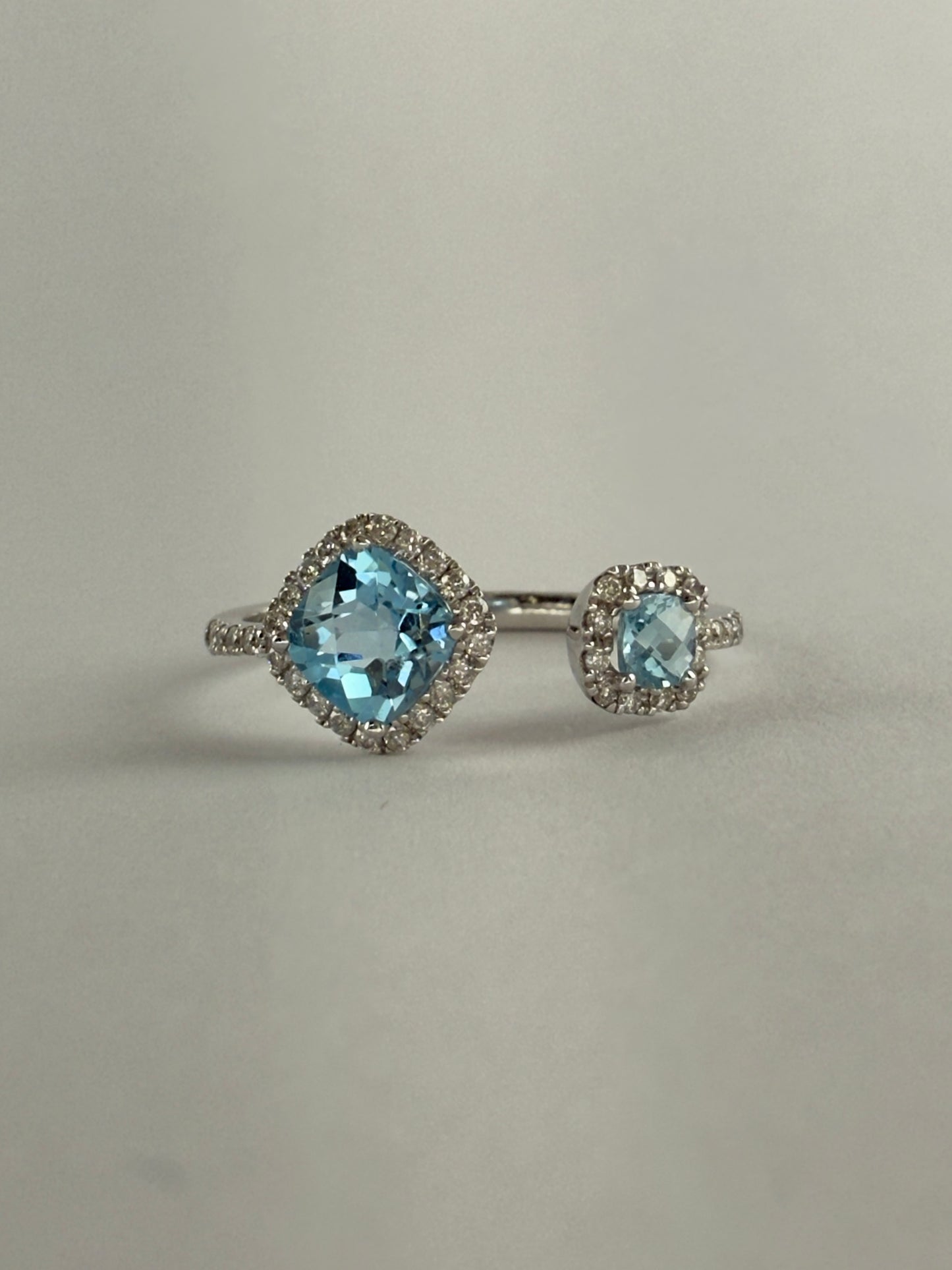 Blue Topaz and Diamond Open Ring