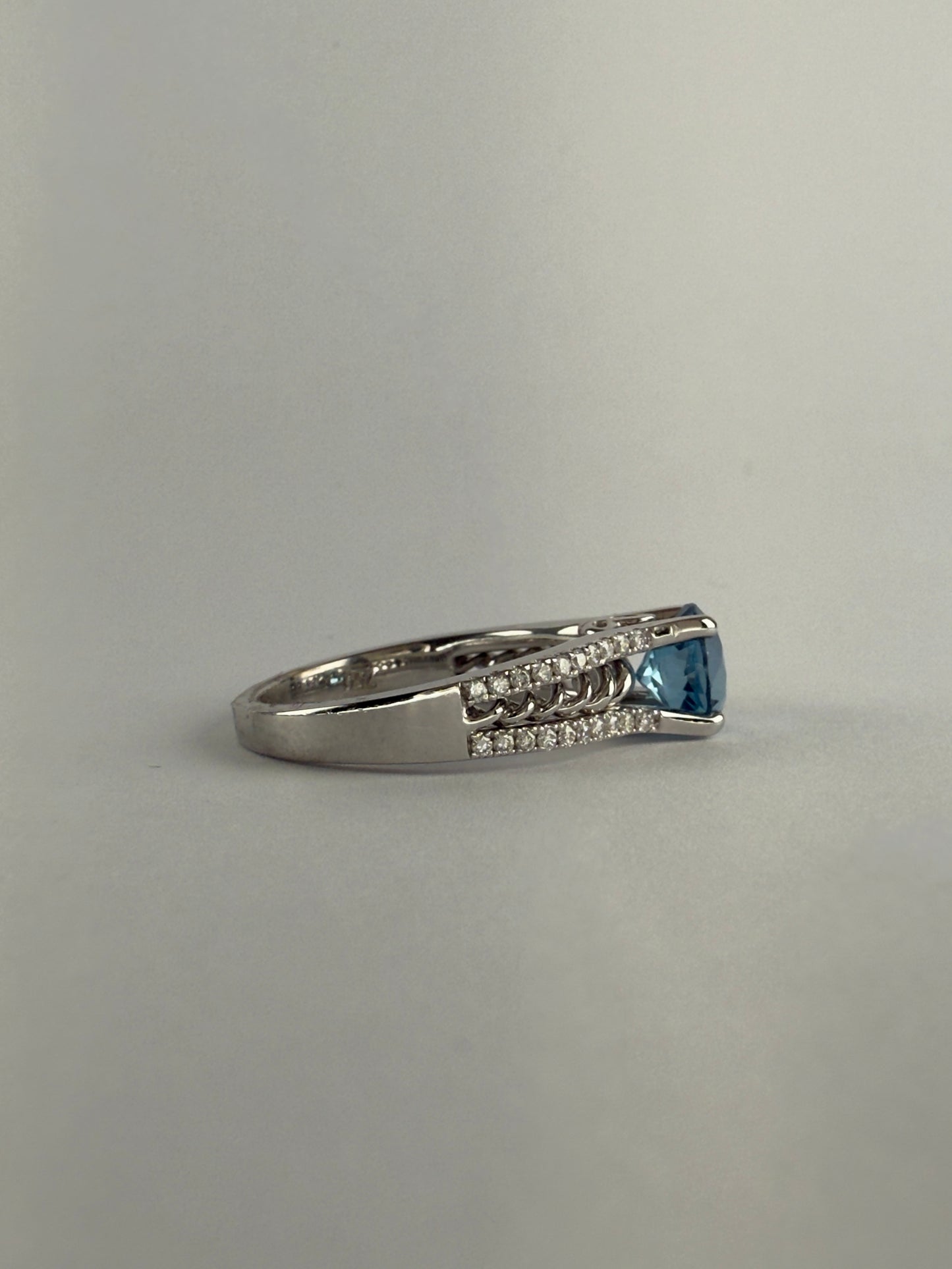 Blue Topaz and Diamond Ring