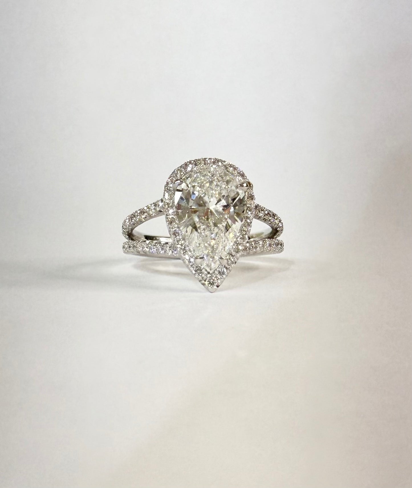 Pear cut Diamond Halo Engagement Ring